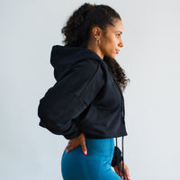 IN THICK THIGHS WE TRUST Crop Hoodie