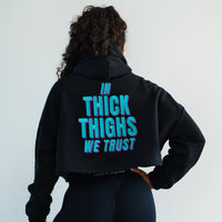 IN THICK THIGHS WE TRUST Crop Hoodie