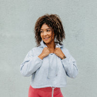 THICK THIGHS SAVE LIVES Crop Hoodie
