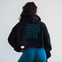 THICK THIGHS SAVE LIVES Crop Hoodie