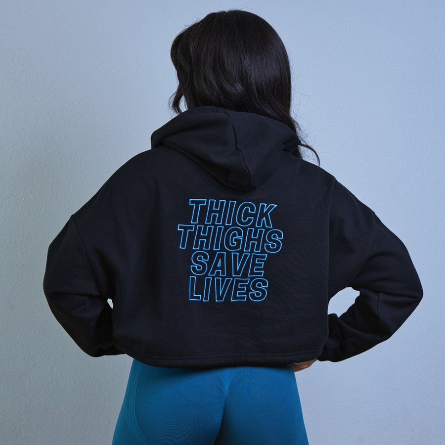 Model wearing Thick Athletics Crop Hoodie