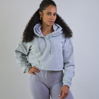 Model wearing Thick Athletics Crop Hoodie