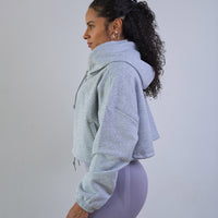 Model wearing Thick Athletics Crop Hoodie